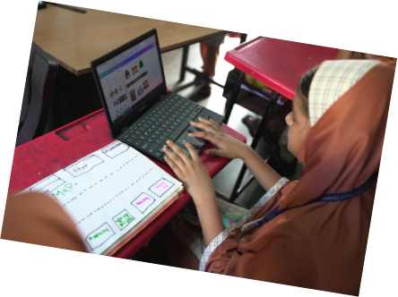 A girl working on a laptop